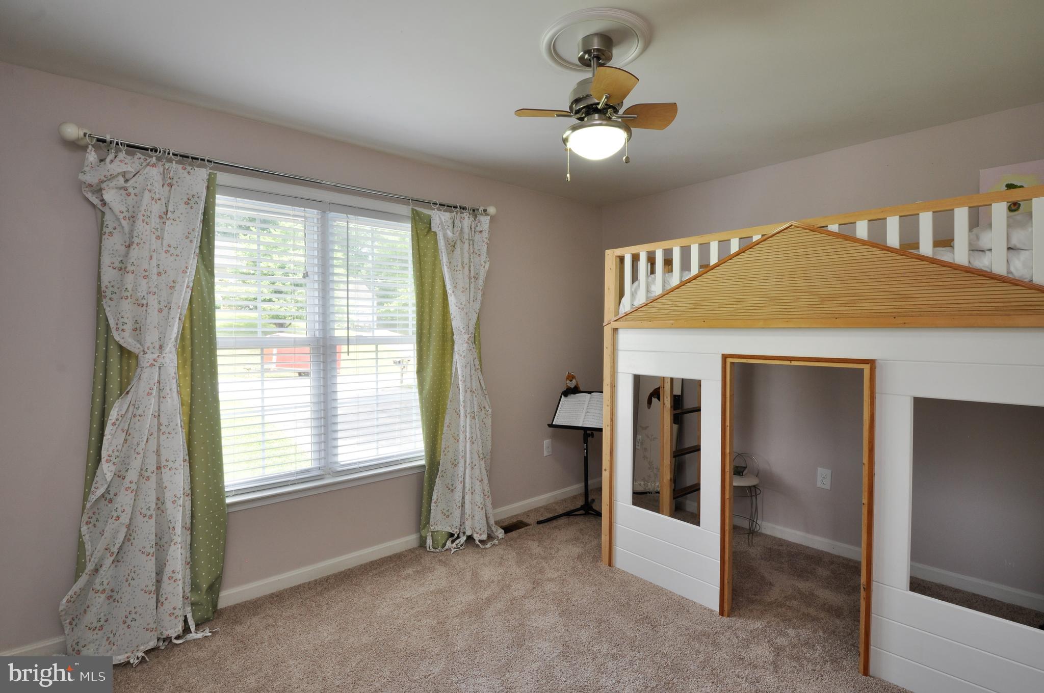 8504 Passapatanzy Road King George, VA 22485 - Photo 23 of 38 Second upstairs bedroom (bed doesn't convey)