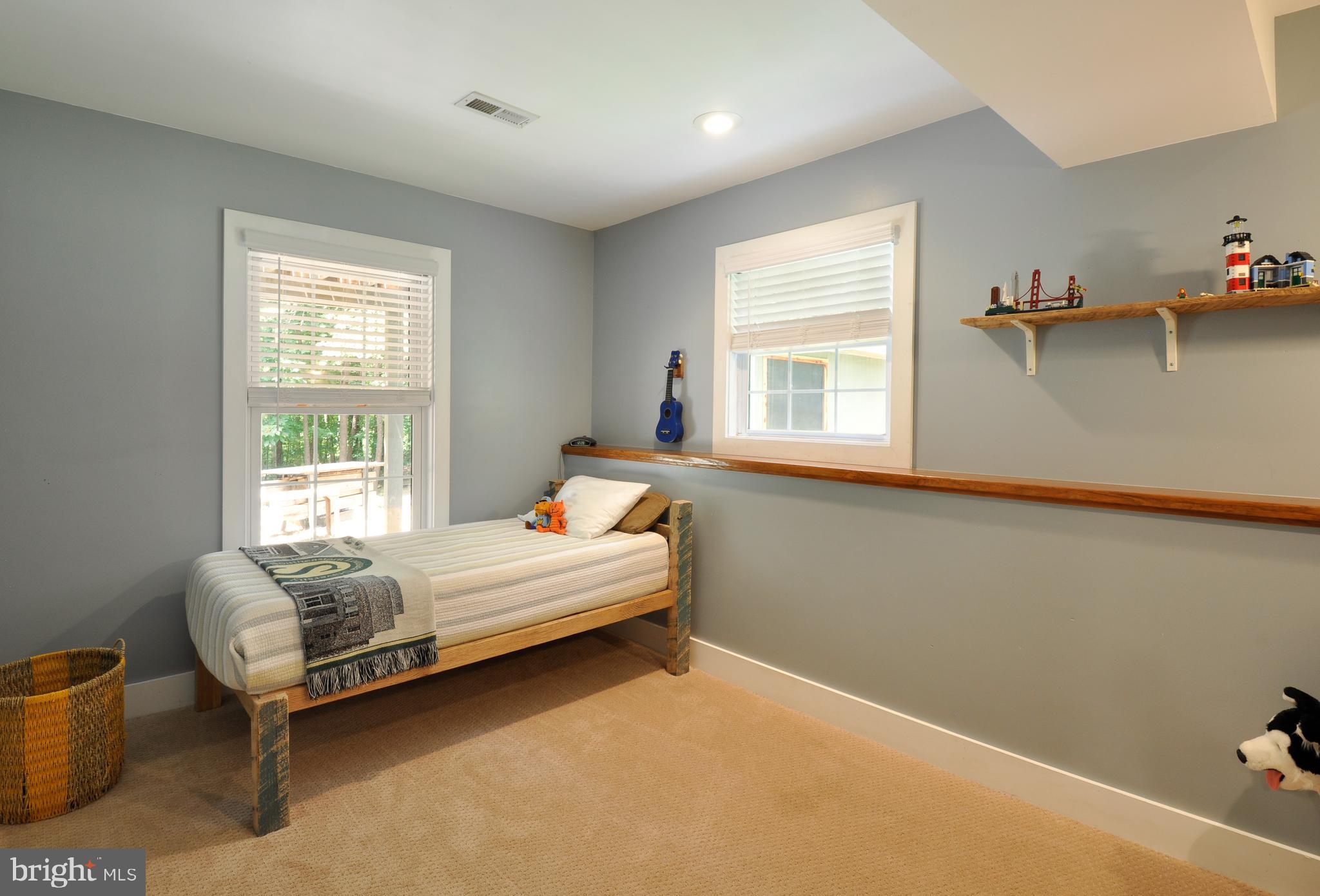 8504 Passapatanzy Road King George, VA 22485 - Photo 32 of 38 4th bedroom downstairs (NTC, no closet)