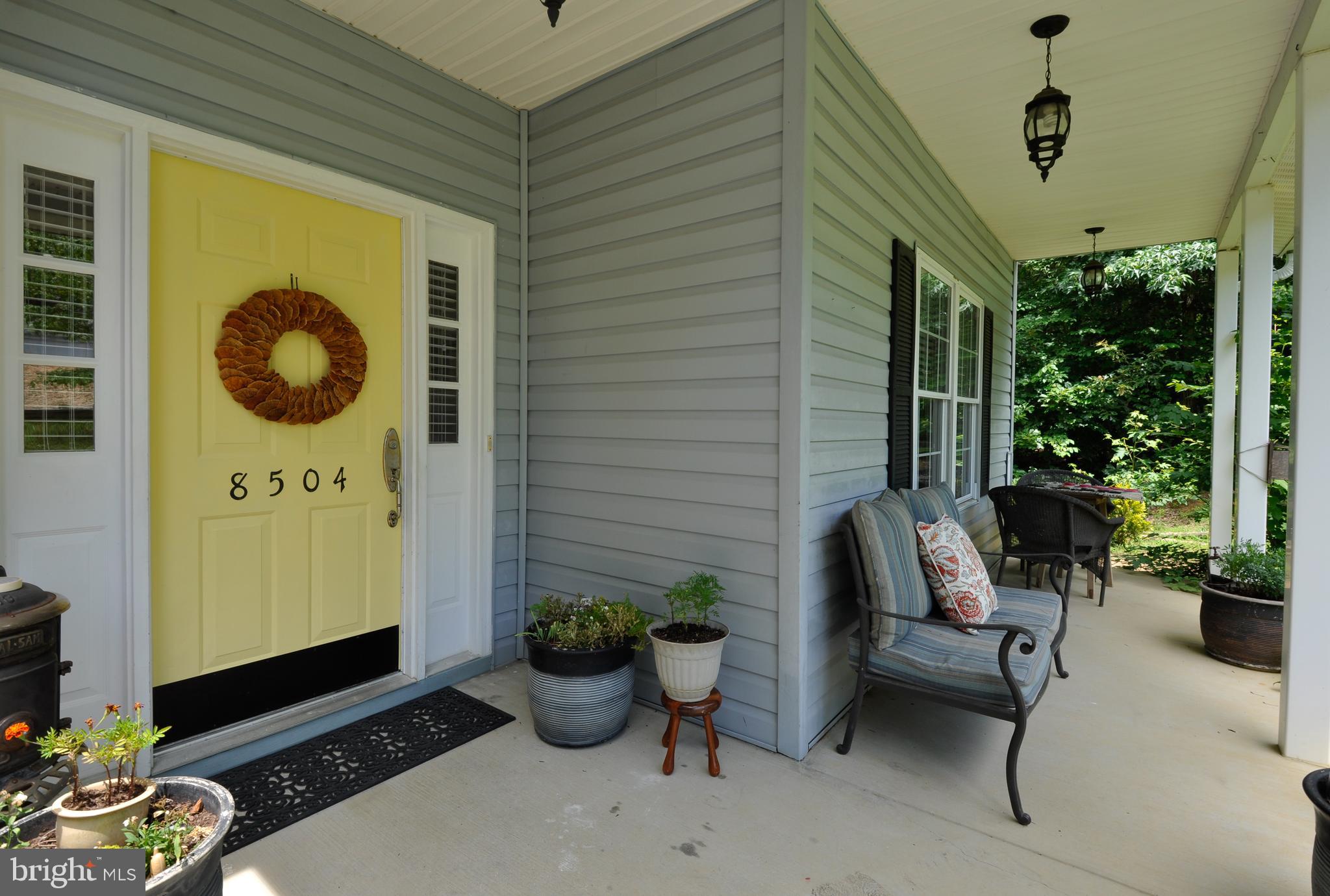 8504 Passapatanzy Road King George, VA 22485 - Photo 6 of 38 Spacious concrete porch