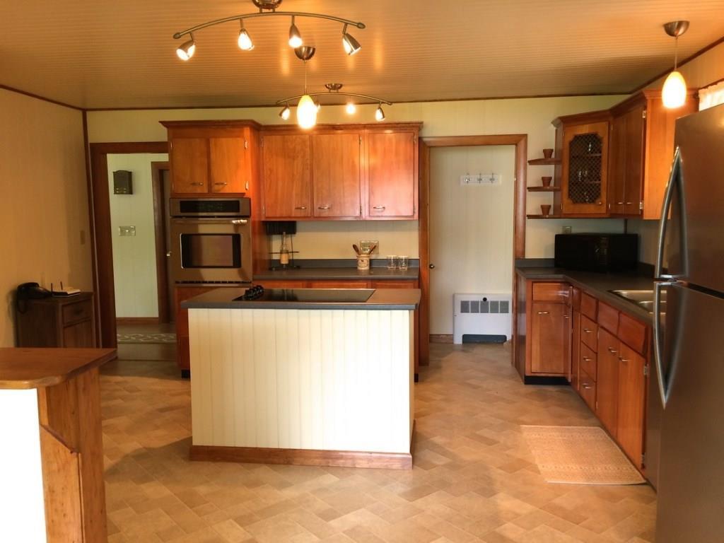 202 Little Deer Isle Road Little Deer Isle, ME 04650 - Photo 17 of 35 Center island cooking area with wall...