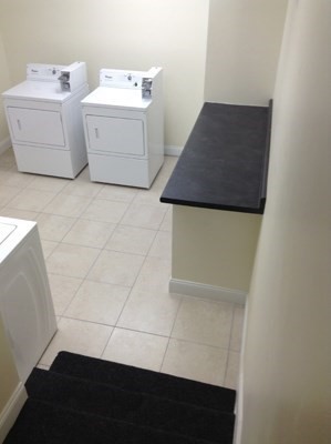 506 Beacon Street, Unit 13 Boston, MA 02215 - Photo 3 of 5 a utility room with dryer and washer