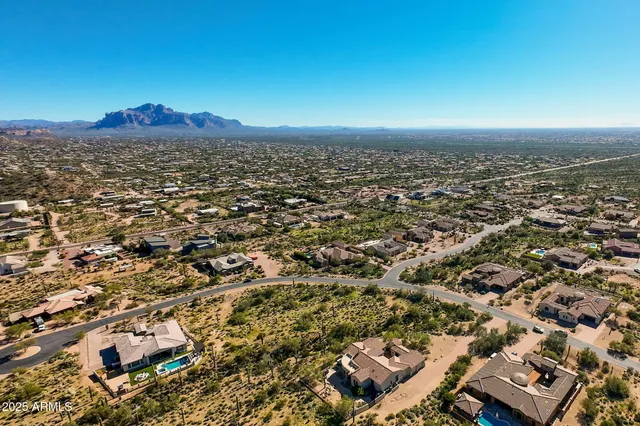 a view of a road with a building in the background