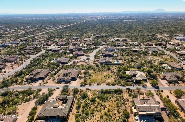a view of a road with an ocean view
