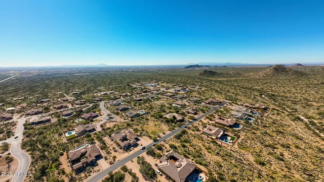 a view of a city with green space