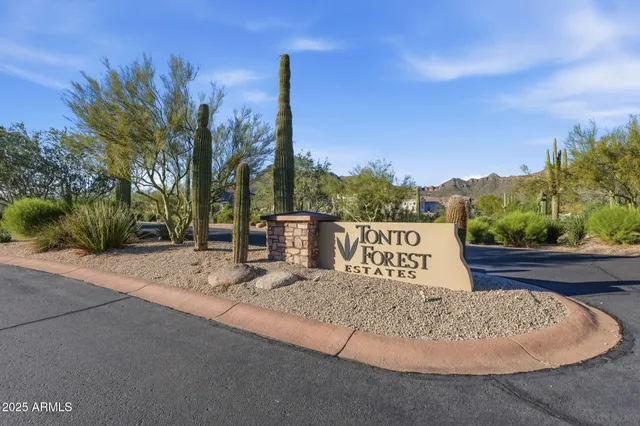 a view of a park with a sign board