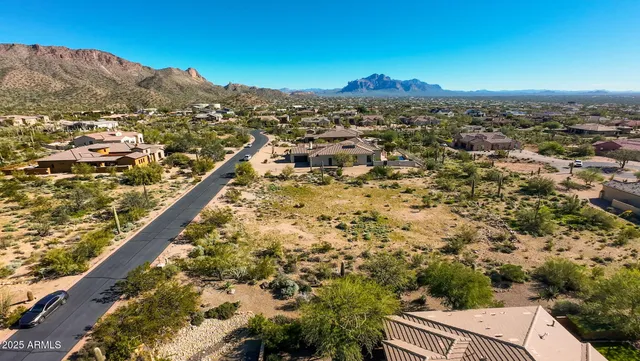a view of a city with mountains in the background