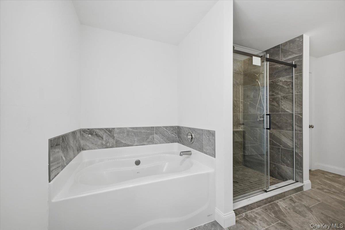 196 Fawn Hill Road Prattsville, NY 12468 - Photo 31 of 48 a bathroom with a bathtub