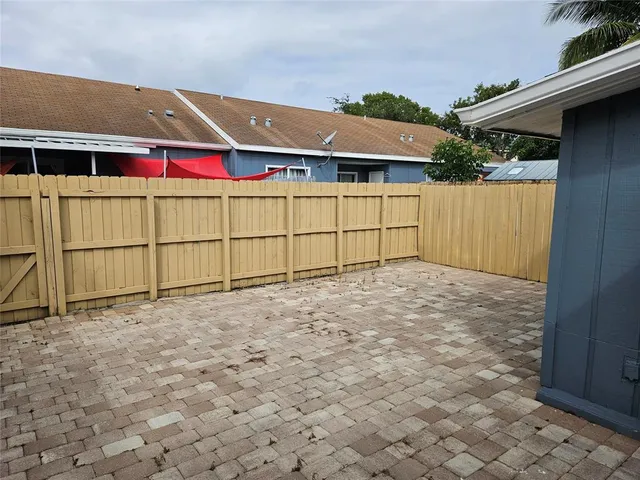 a view of backyard with cabin