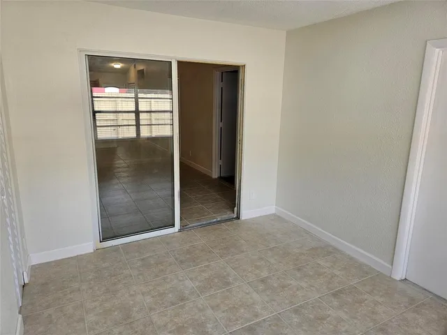 a view of a room that has a window in it