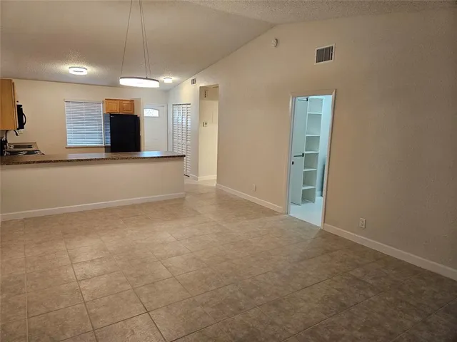 a view of a livingroom with a flat screen tv