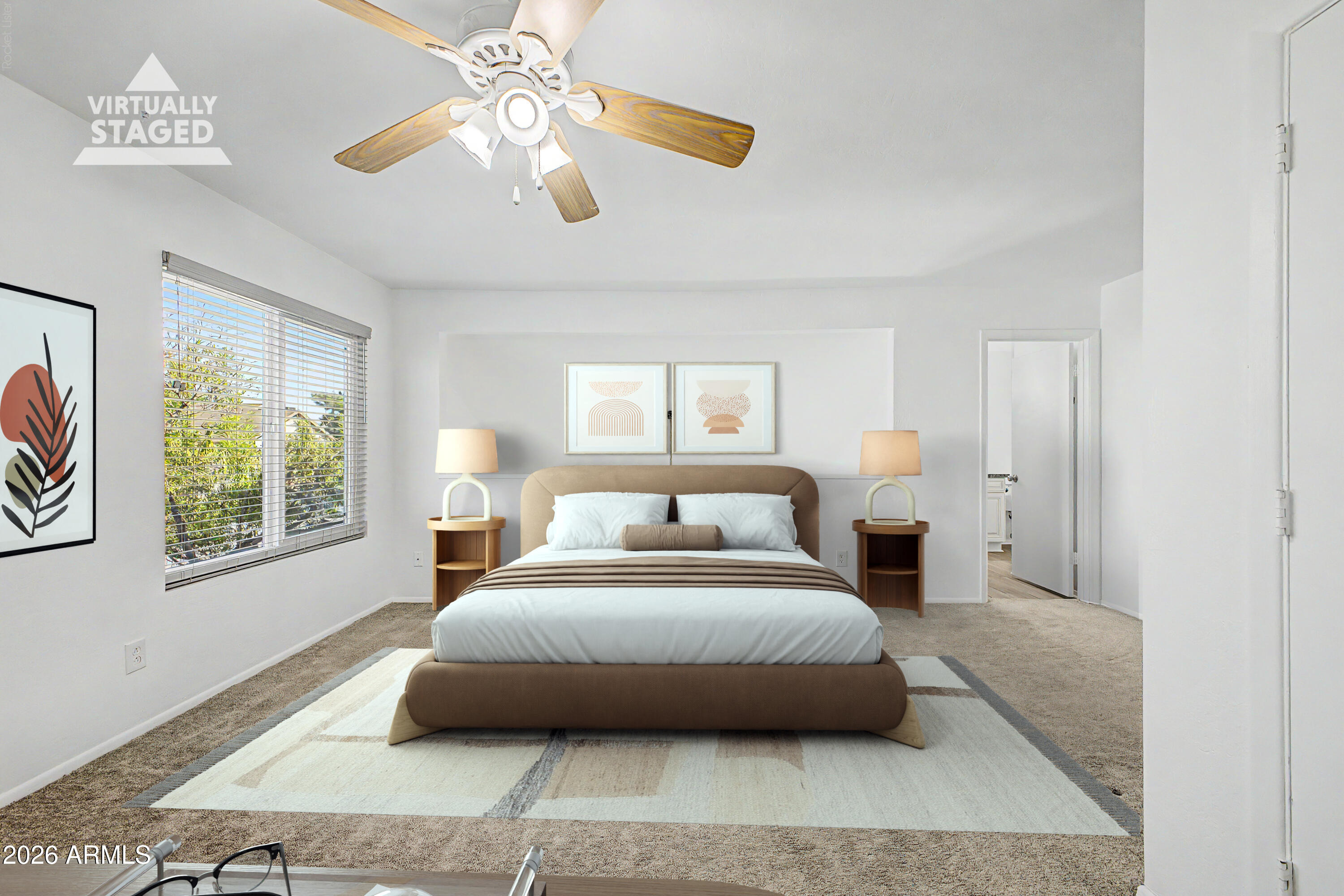 2455 East Broadway Road, Unit 103 Mesa, AZ 85204 - Photo 10 of 22 a spacious bedroom with a large bed and a chandelier