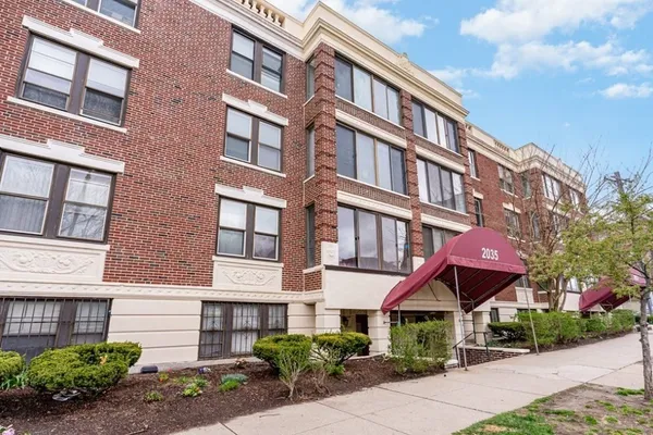 a front view of a multi story residential apartment building