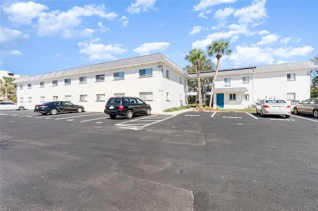 a cars parked in front of a building