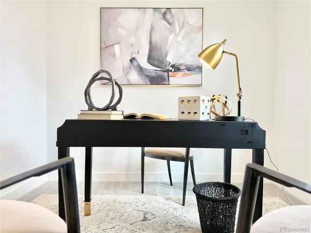 a view of a living room and bathroom