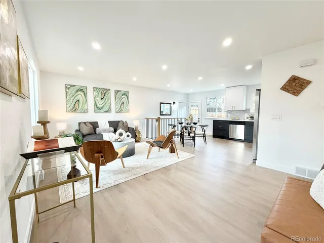 a living room with furniture and a table