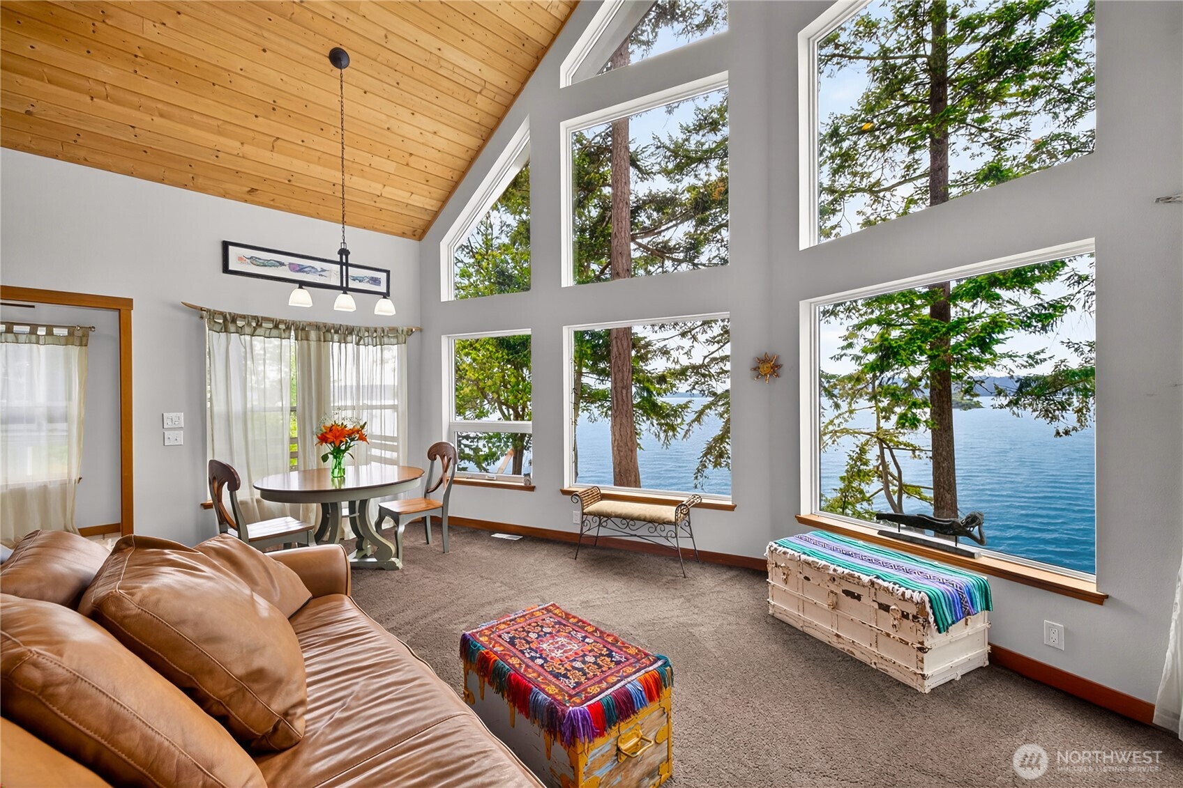 17946 Cobahud Road La Conner, WA 98257 - Photo 21 of 40 a living room with furniture and a large window