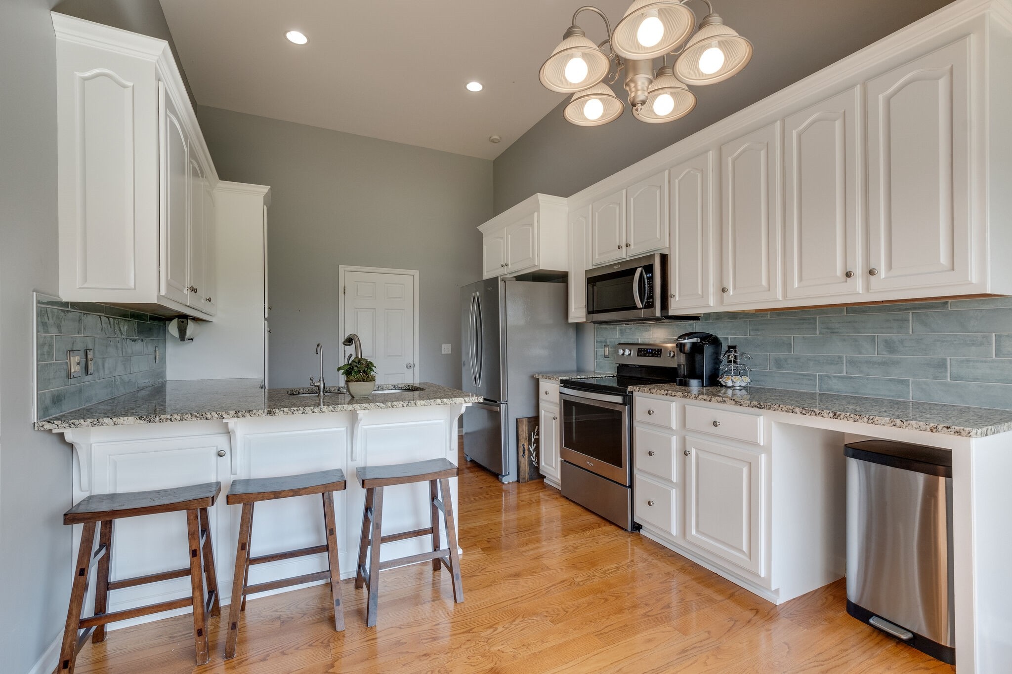 1978 Lasea Road Spring Hill, TN 37174 - Photo 16 of 31 a kitchen with cabinets appliances and a counter space