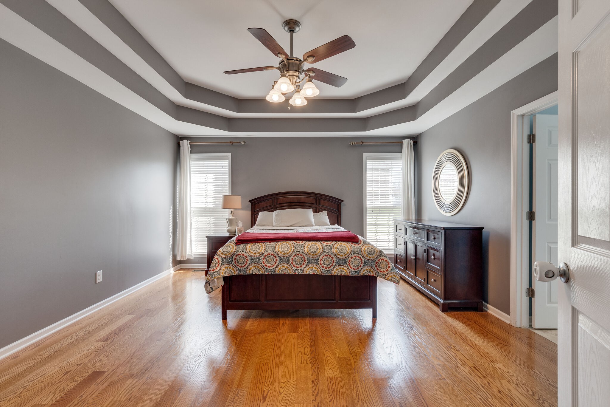 1978 Lasea Road Spring Hill, TN 37174 - Photo 19 of 31 a bedroom with a bed and a chandelier