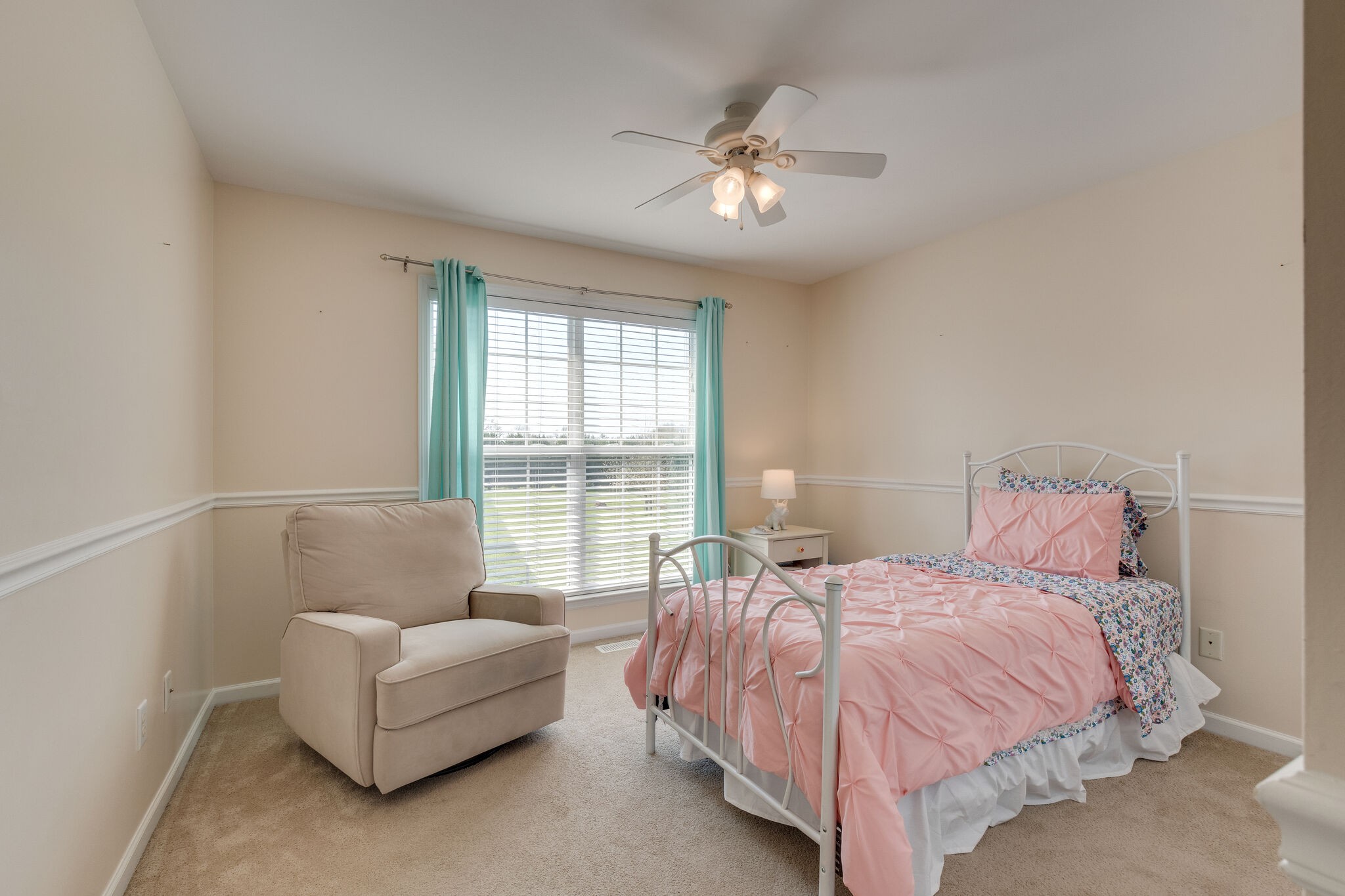 1978 Lasea Road Spring Hill, TN 37174 - Photo 22 of 31 a bedroom with a bed and a couch