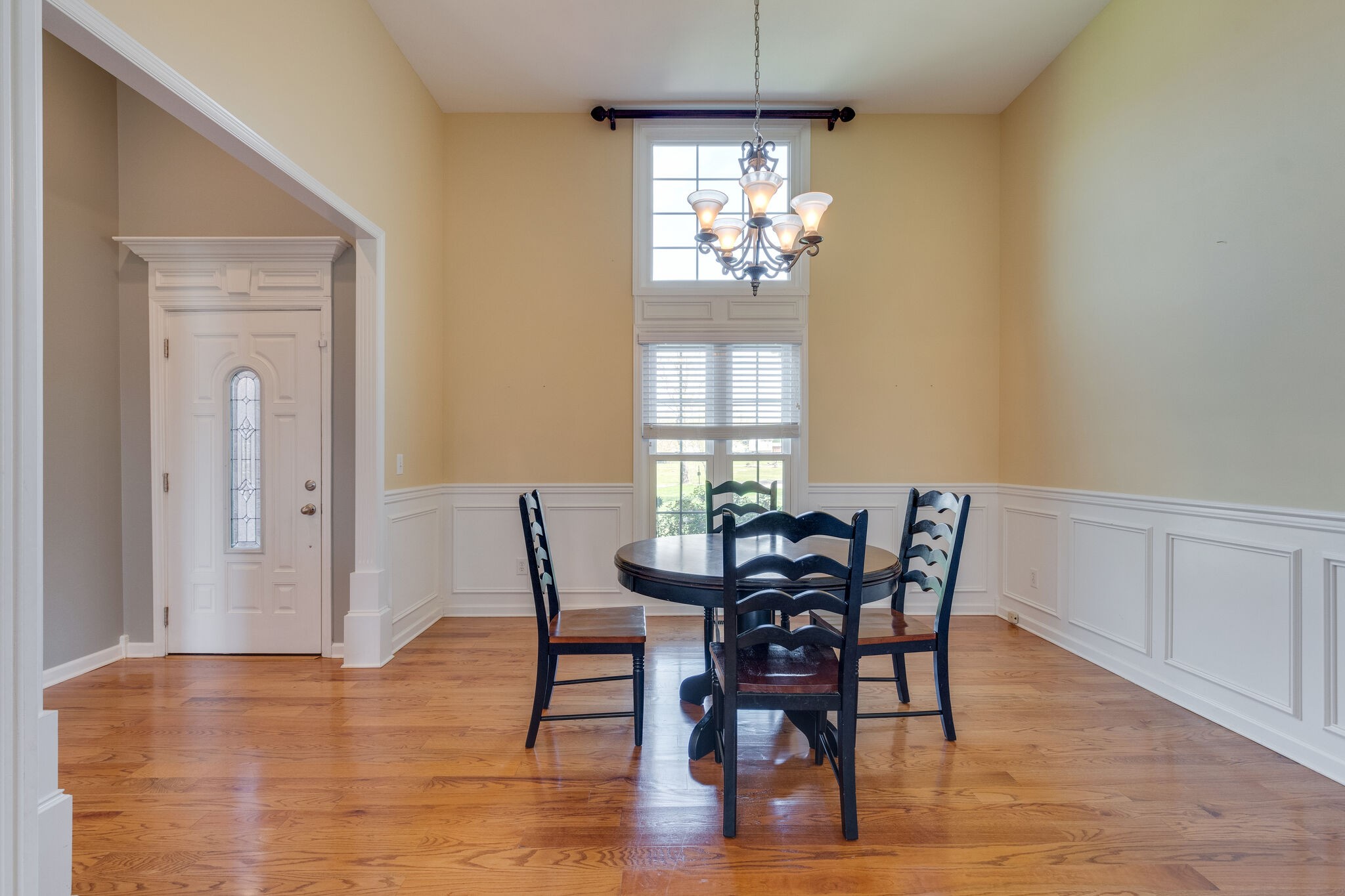 1978 Lasea Road Spring Hill, TN 37174 - Photo 6 of 31 a view of a dining room with furniture a chandelier and wooden floor