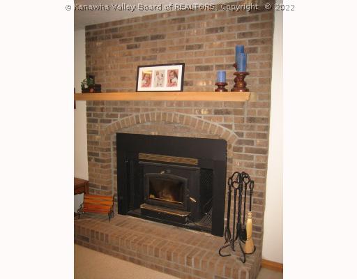 199 Bluelick Road Winfield, WV 25213 - Photo 4 of 8 Den/Family/Great Room. Beautiful woodburning fireplace