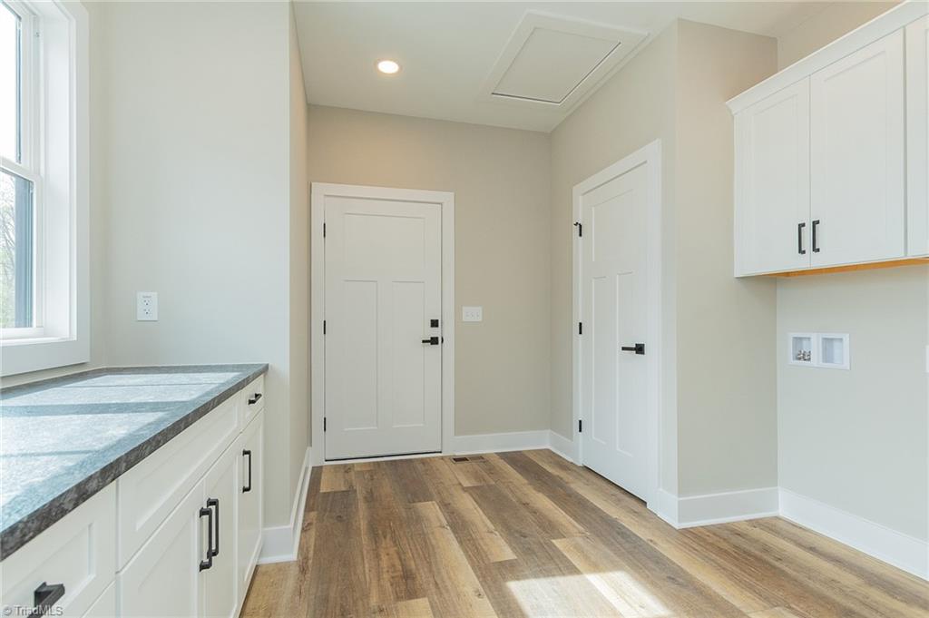 1314 Riverside Drive Lexington, NC 27292 - Photo 14 of 41 Laundry room with closet. Access to two car garage. 24 X 24