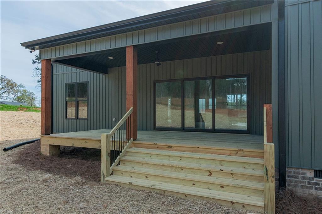 1314 Riverside Drive Lexington, NC 27292 - Photo 32 of 41 Can you imagaine entertaining your family & friends on this deck. 12 foot door opens all the way up to allow your traffic to flow with ease.