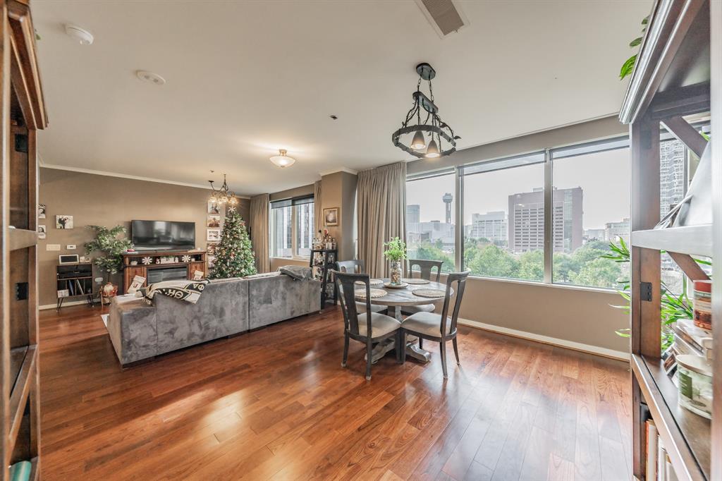 1200 Main Street, Unit 306 Dallas, TX 75202 - Photo 15 of 35 a living room with furniture and a large window