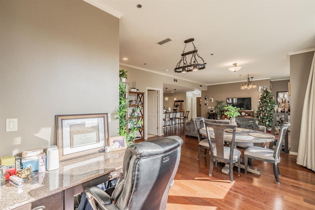 1200 Main Street, Unit 306 Dallas, TX 75202 - Photo 21 of 35 a dining room with furniture and window