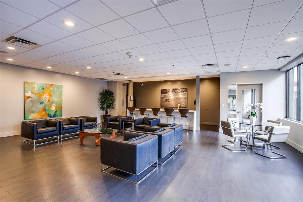 1200 Main Street, Unit 306 Dallas, TX 75202 - Photo 33 of 35 a living room with furniture and a wooden floor