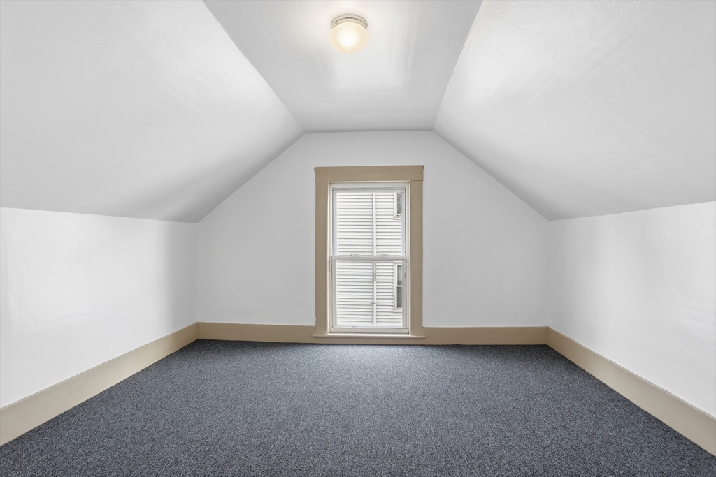 12 Whitcomb Street Webster, MA 01570 - Photo 29 of 40 an empty room with a window