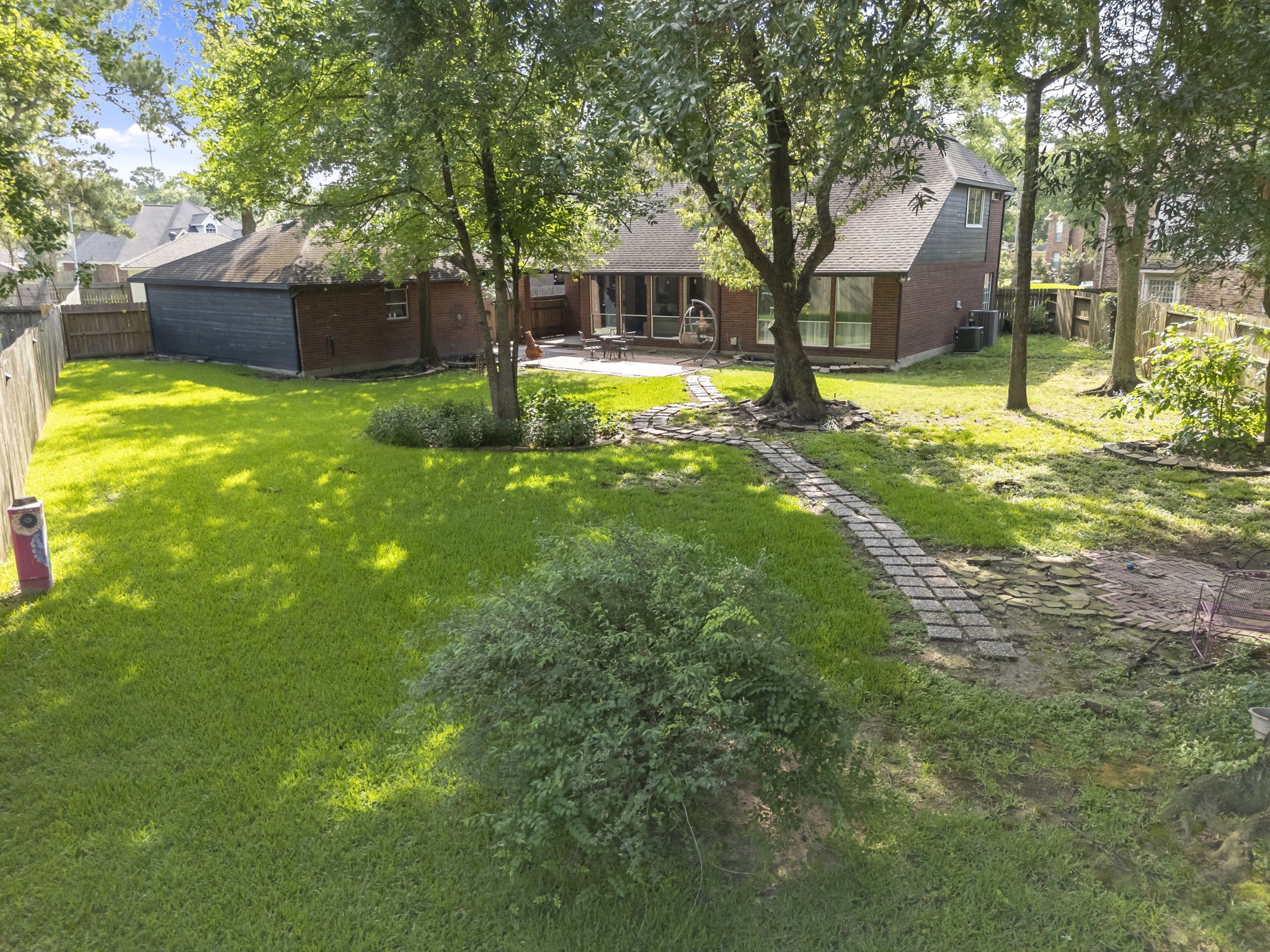 12907 Ryaneagles Circle Houston, TX 77044 - Photo 46 of 48 a view of a house with a yard and tree
