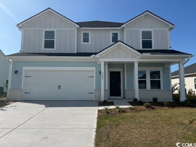 2409 Grand Mdw Drive Longs, SC 29568 - Photo 1 of 40 Craftsman inspired home with a garage, a front law