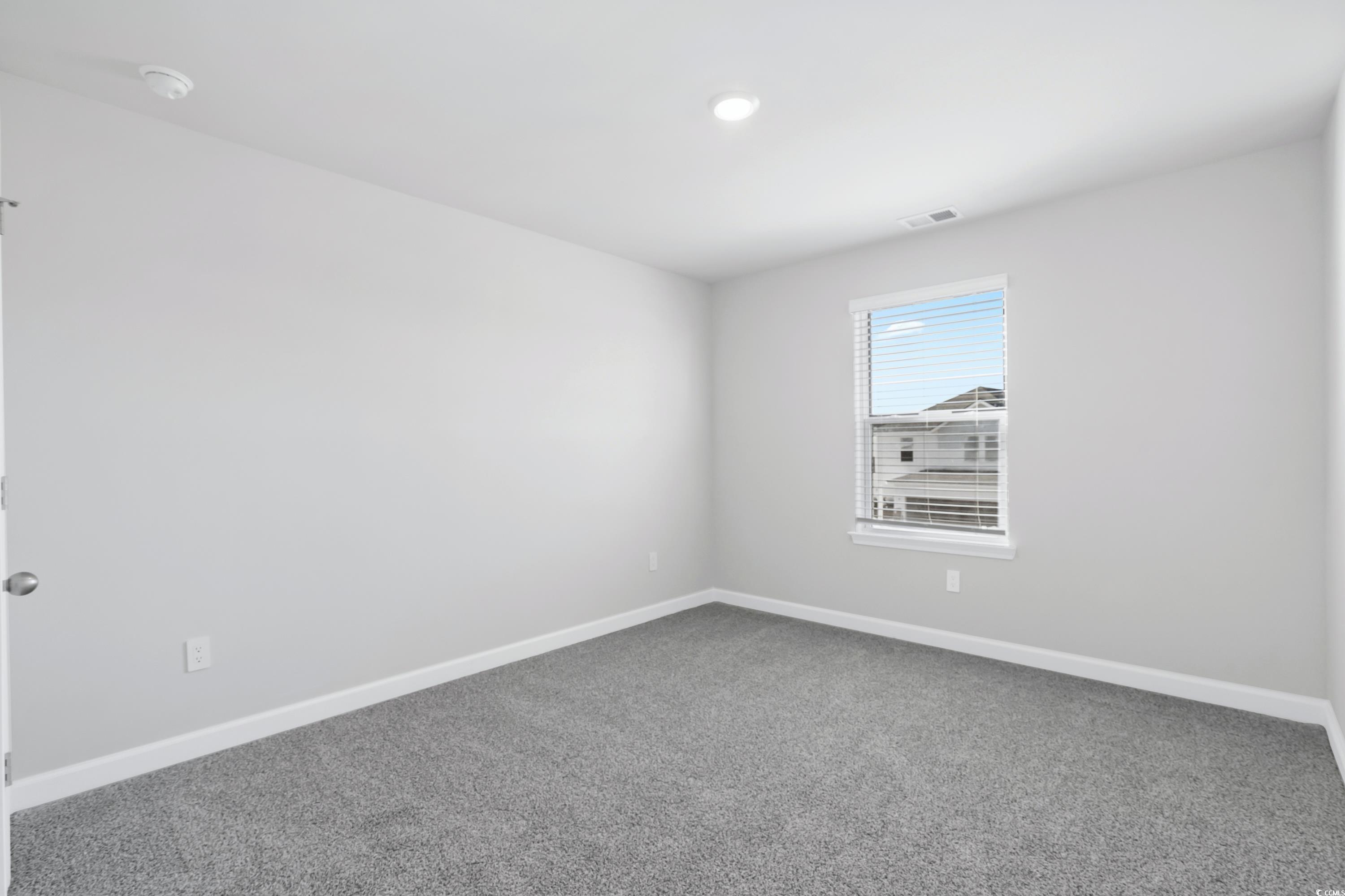2409 Grand Mdw Drive Longs, SC 29568 - Photo 26 of 40 Unfurnished room featuring carpet flooring