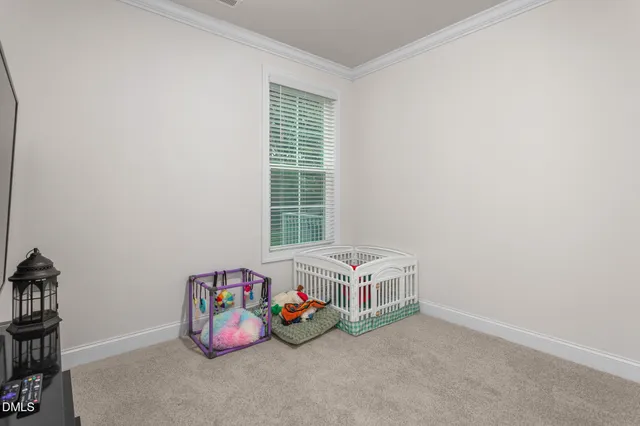 a bathroom with a granite countertop sink mirror vanity and toilet