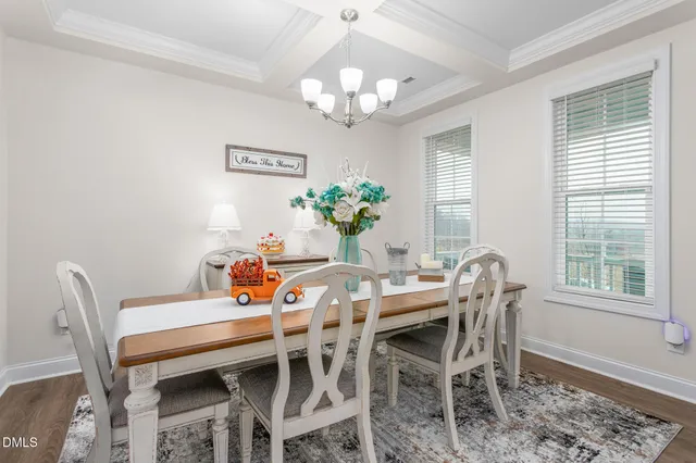 a spacious bedroom with a bed and a large window