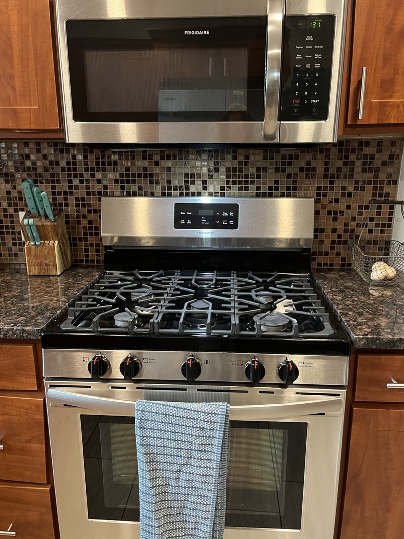 2990 Kane Road Leland, IL 60531 - Photo 9 of 42 a stove top oven sitting inside of a kitchen