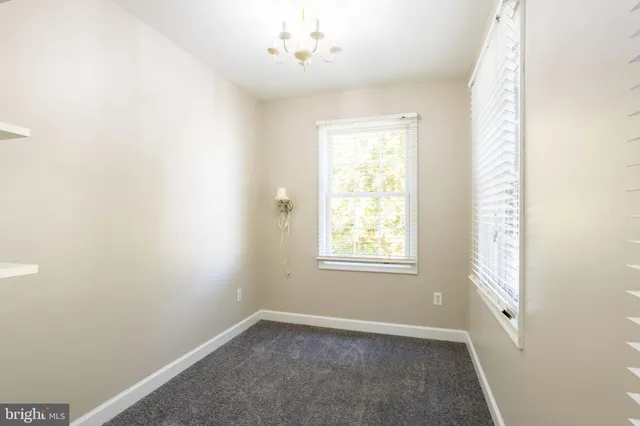 a picture of a bench in front of a door