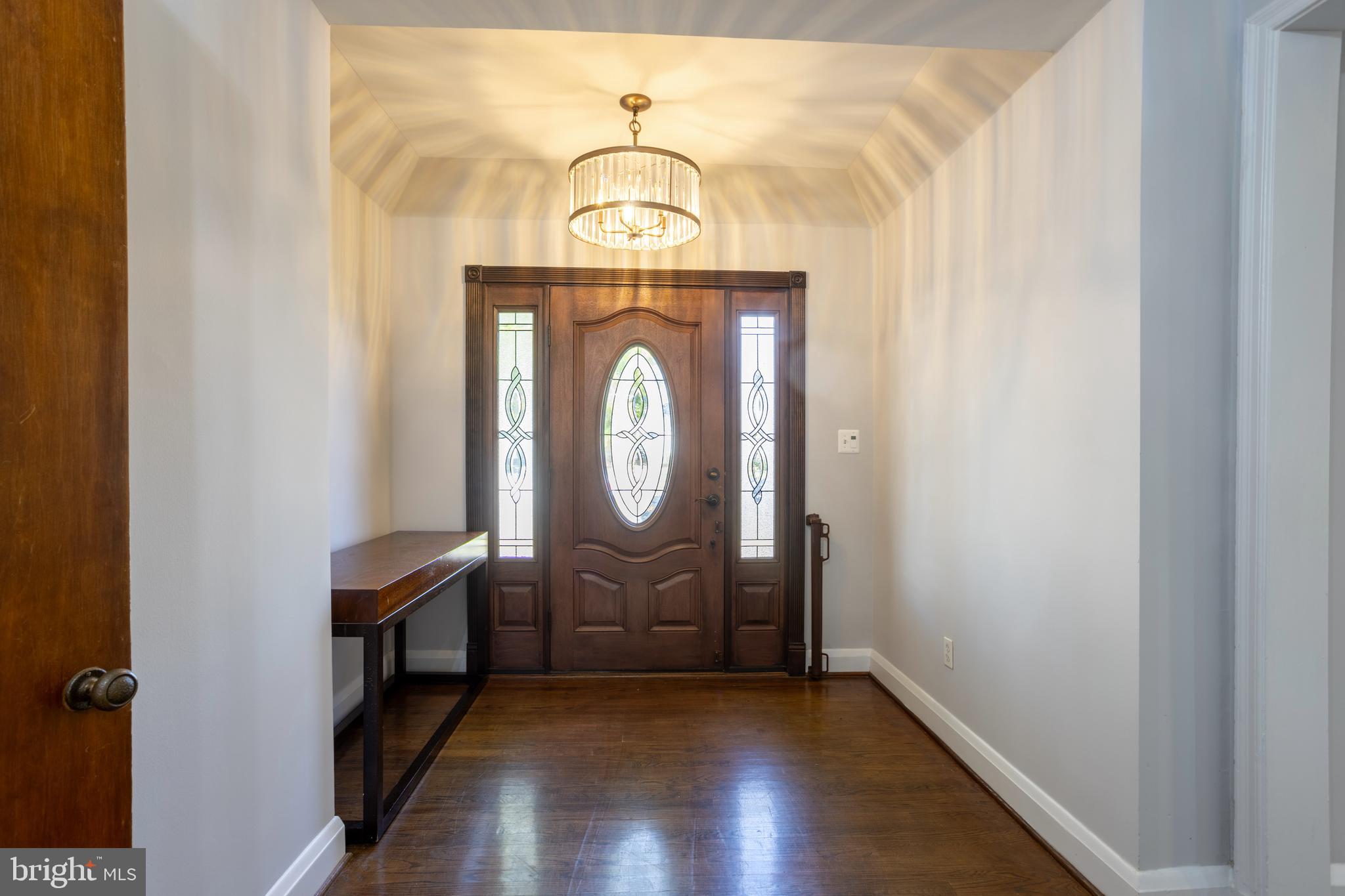 3306 Labyrinth Road Baltimore, MD 21215 - Photo 5 of 66 a view of a entryway door with wooden floor