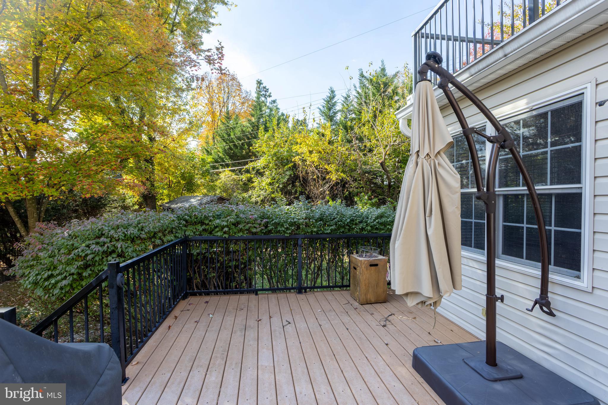 3306 Labyrinth Road Baltimore, MD 21215 - Photo 63 of 66 a view of balcony with wooden floor and fence