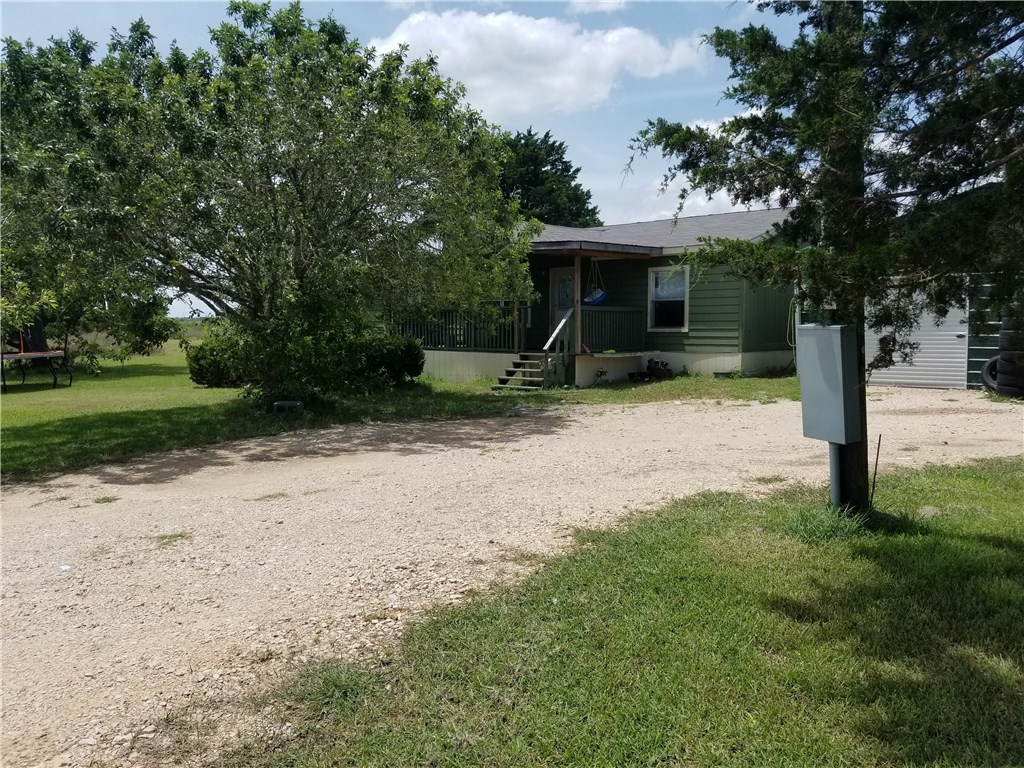376 Cross Meadows Buda, TX 78610 - Photo 1 of 1 a view of a house with a yard and tree