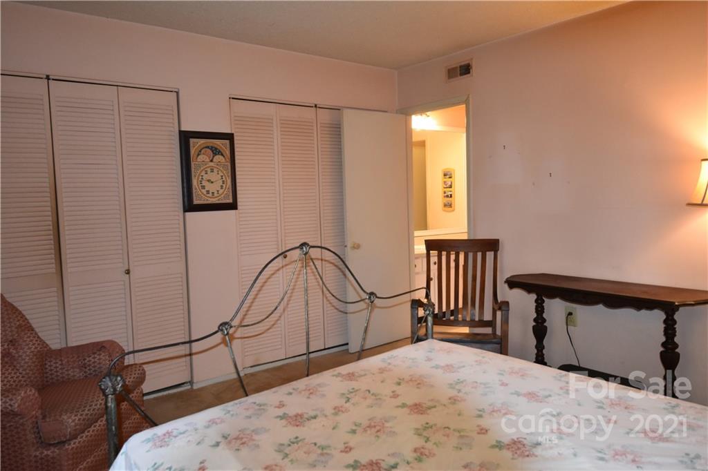 4906 Sardis Road, Unit E Charlotte, NC 28270 - Photo 12 of 24 a view of a livingroom with furniture and a window
