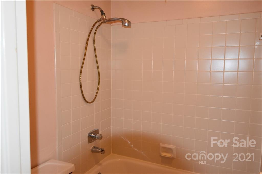 4906 Sardis Road, Unit E Charlotte, NC 28270 - Photo 15 of 24 a bathroom with a shower