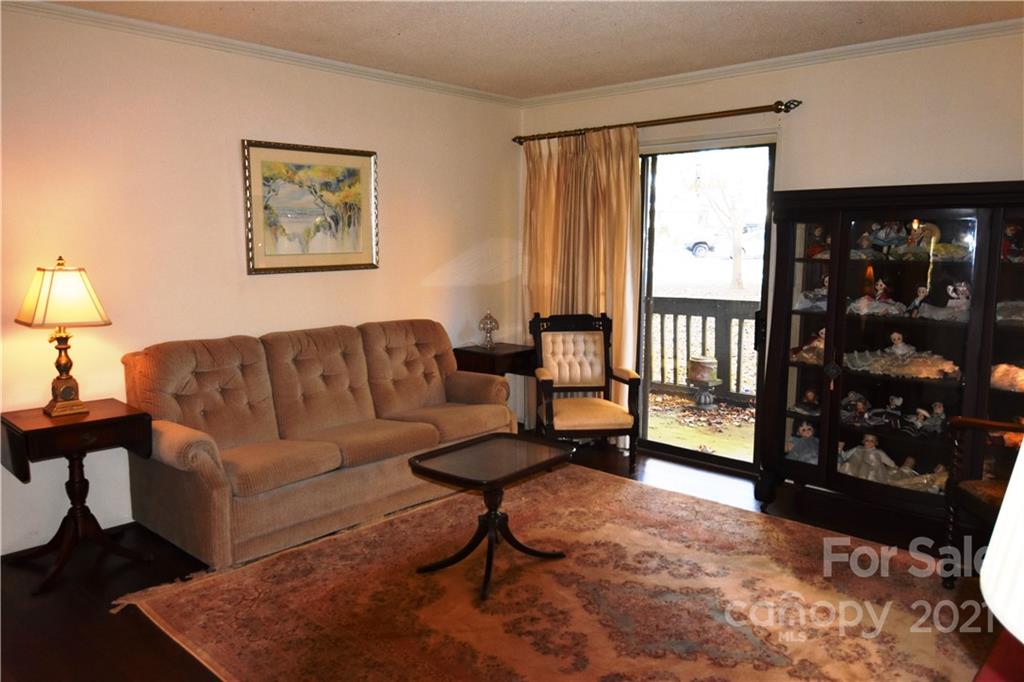 4906 Sardis Road, Unit E Charlotte, NC 28270 - Photo 3 of 24 a living room with furniture and a window