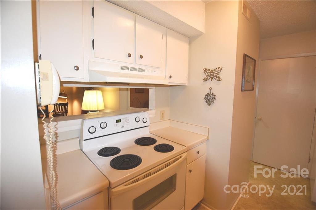 4906 Sardis Road, Unit E Charlotte, NC 28270 - Photo 9 of 24 a utility room with dryer and washer