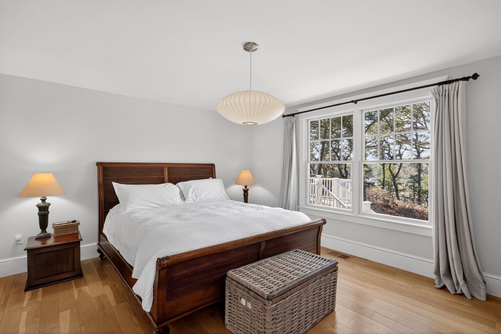 70 Judges Way Chatham, MA 02633 - Photo 14 of 41 a bedroom with a bed wooden floor and a window
