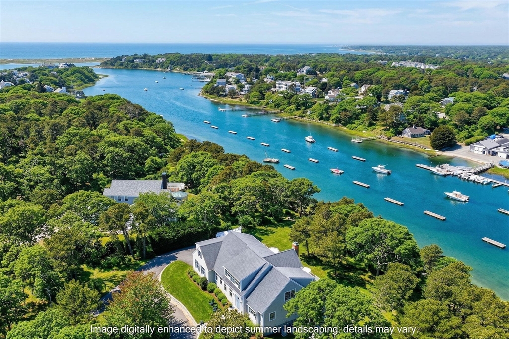 70 Judges Way Chatham, MA 02633 - Photo 2 of 41 an aerial view of a house with a lake view