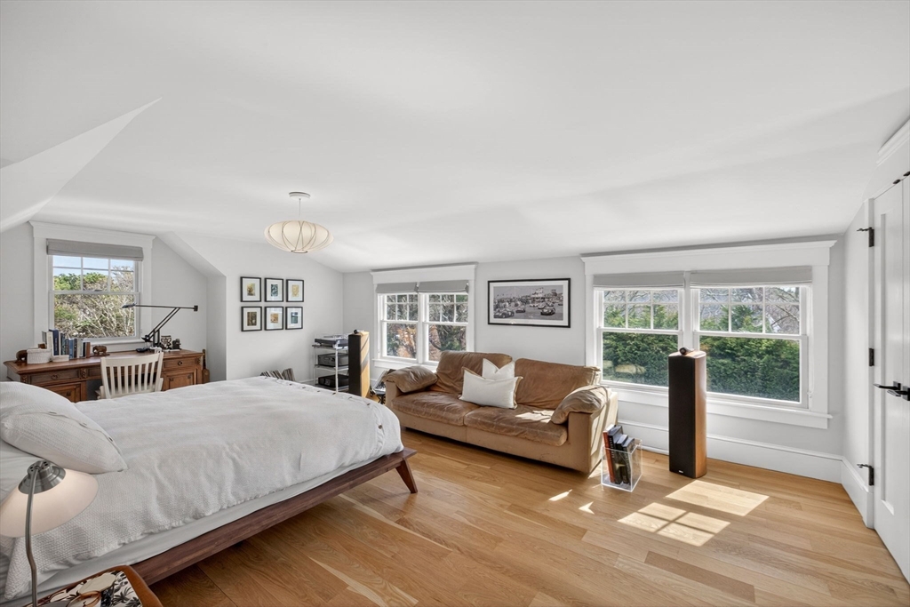 70 Judges Way Chatham, MA 02633 - Photo 22 of 41 a bedroom with a large bed and a couch