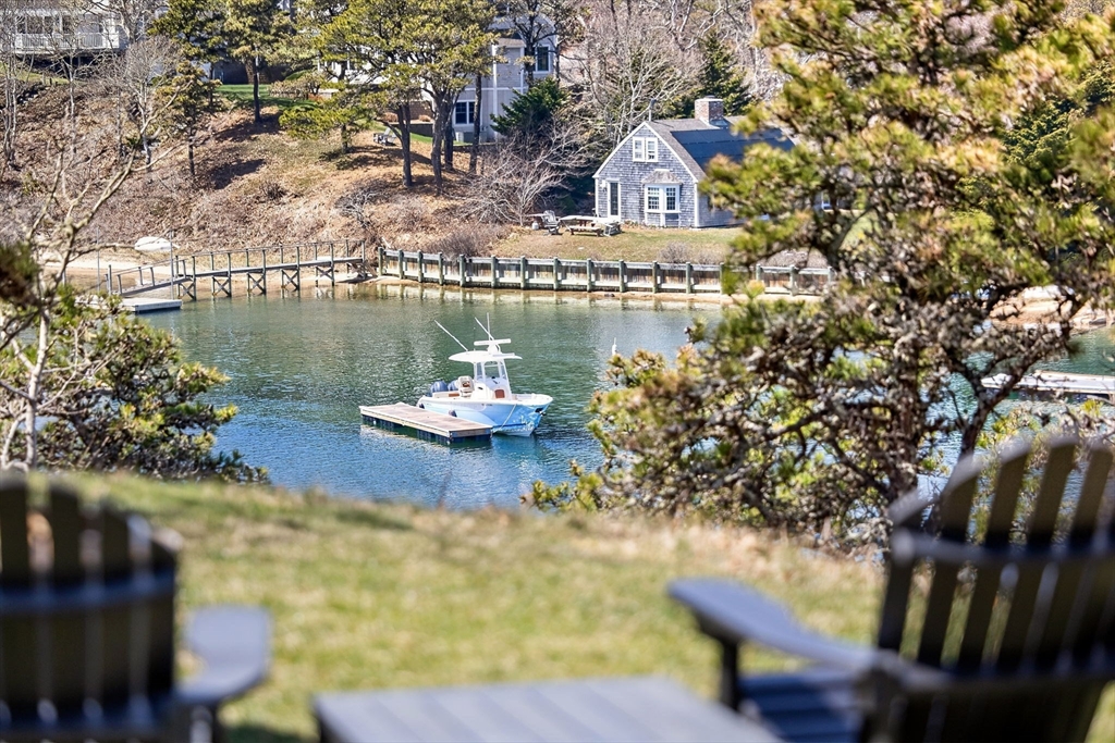70 Judges Way Chatham, MA 02633 - Photo 31 of 41 a view of a lake from a balcony