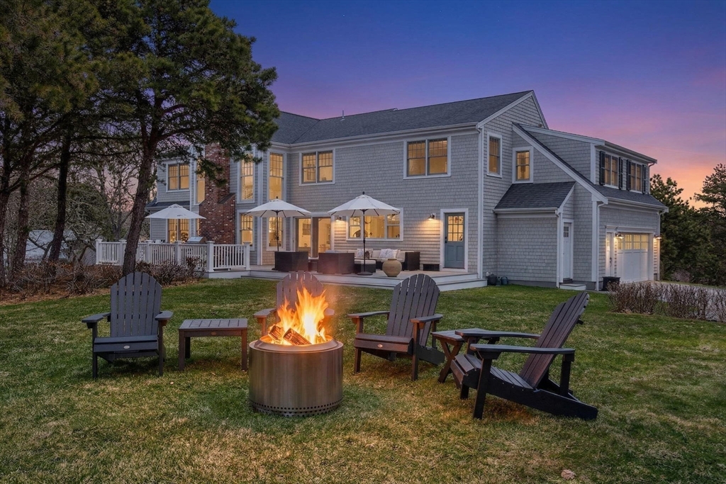 70 Judges Way Chatham, MA 02633 - Photo 33 of 41 a view of a house with backyard and sitting area
